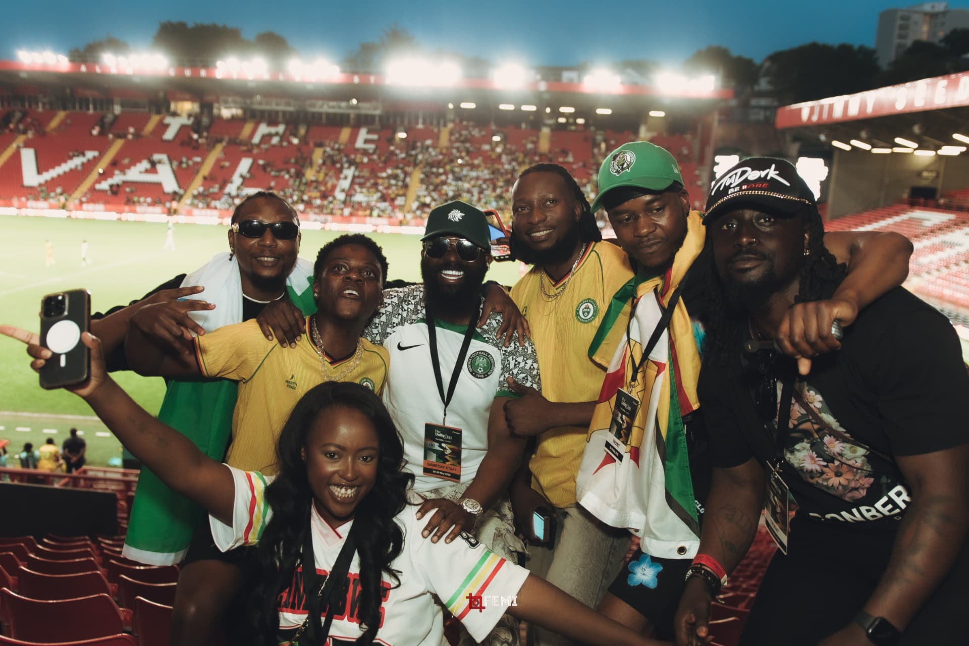 Korrine Sky with the SMADE team and artists in the stands at Unity Cup