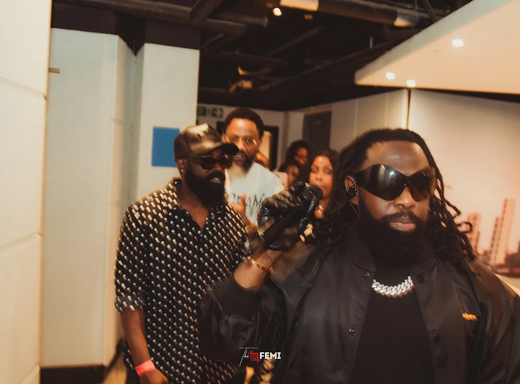 Timaya backstage with the show team before the performance