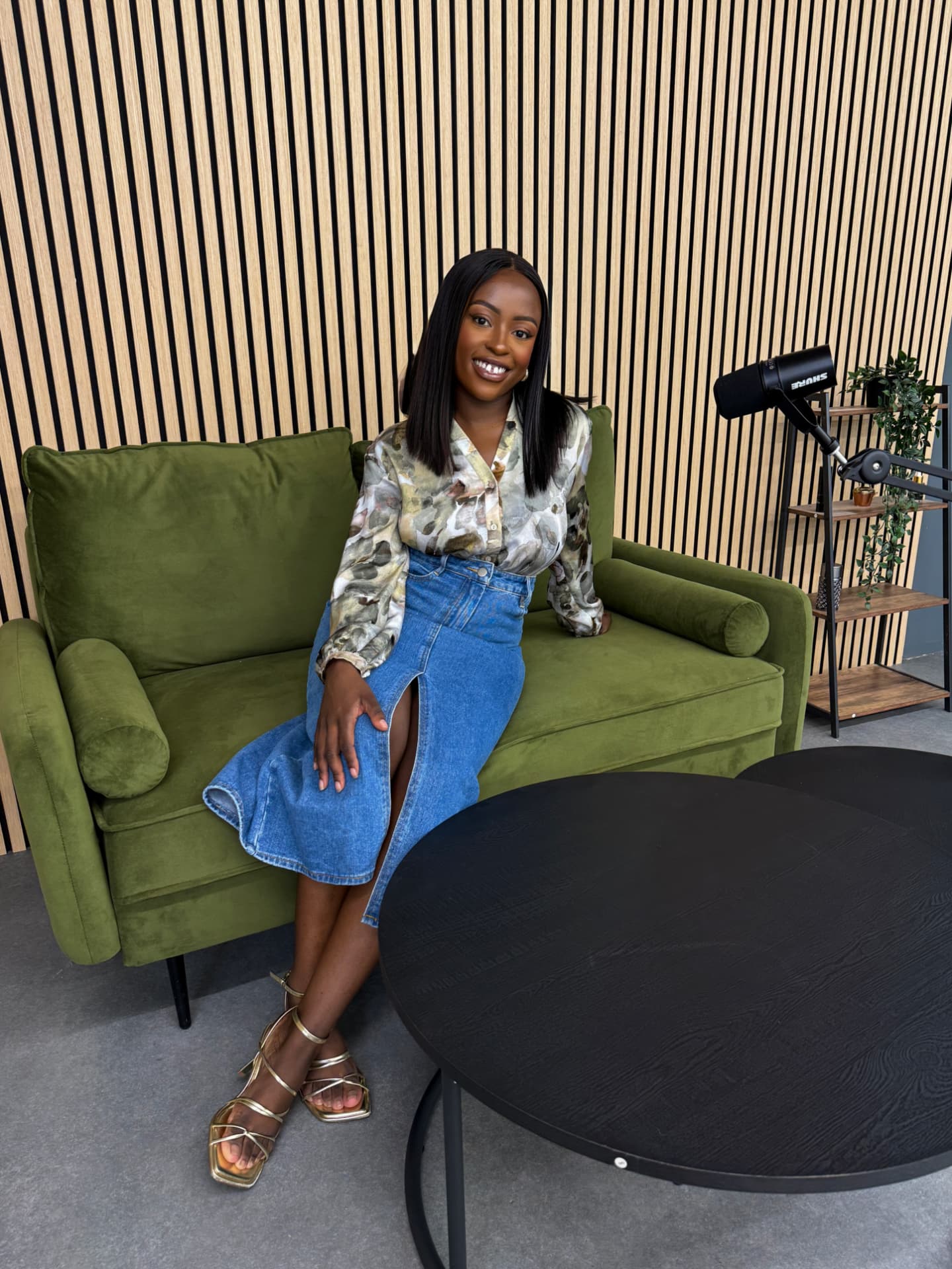 Korrine Sky in a podcast studio