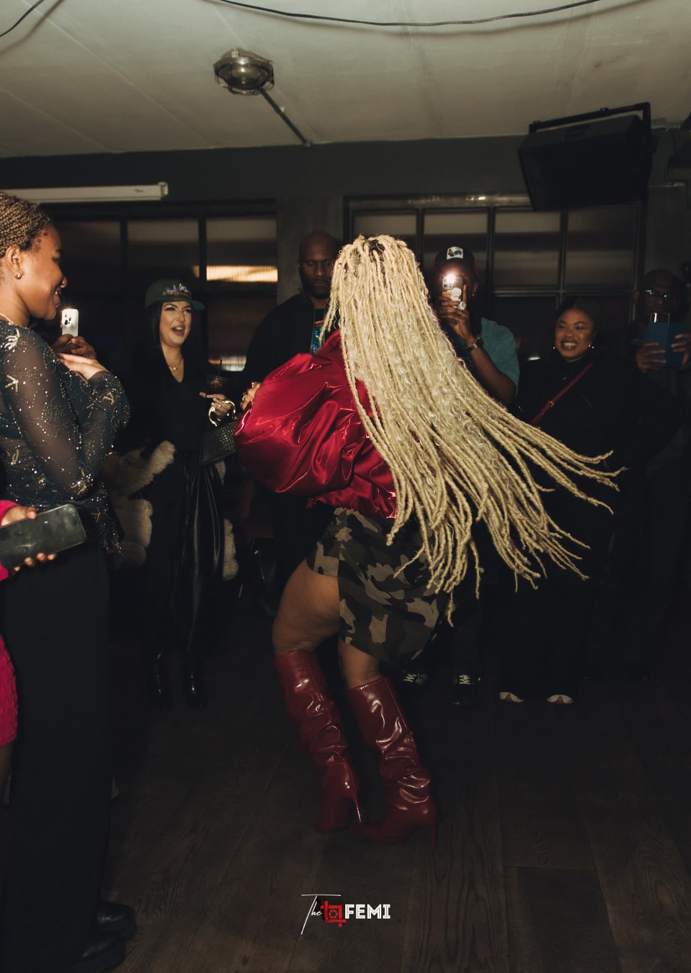 LIYA performing in the middle of the crowd at her listening party